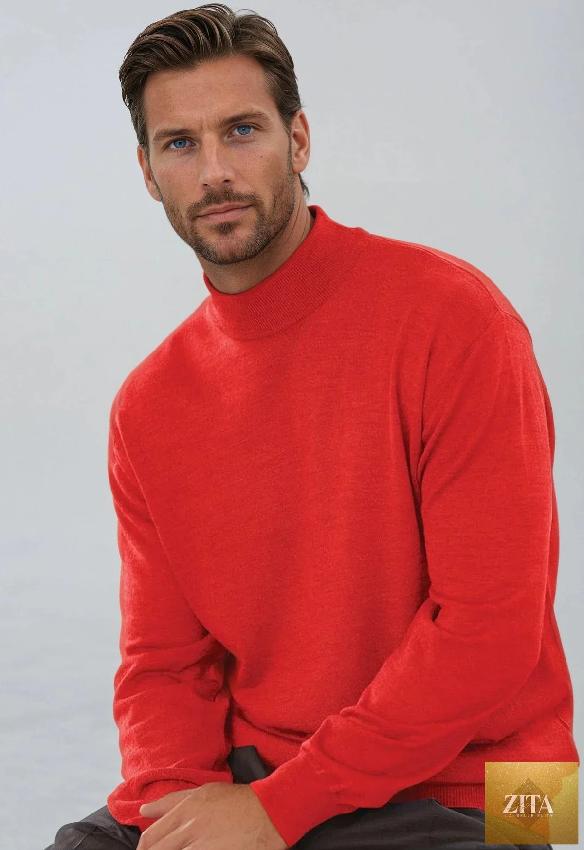Gionfriddo Sportswear long-sleeve knit mock neck sweater in cozy, cream-colored fabric shown on a hanger.