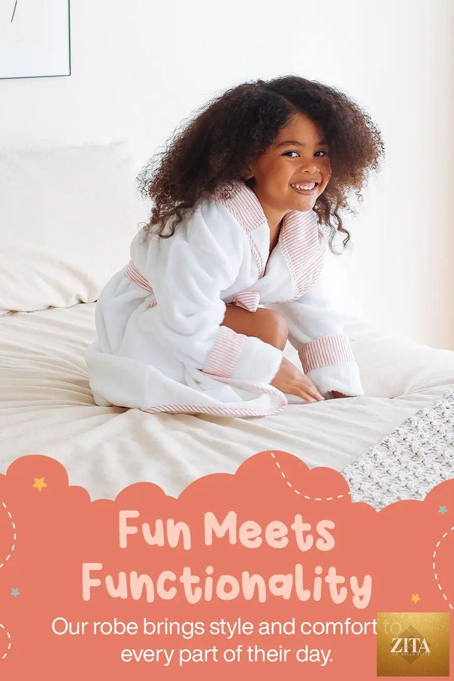 Soft pink kids plush robe from Lotus Linen, designed for toddlers and kids, featuring ultra-soft, cozy fabric and safe, comfortable fit.