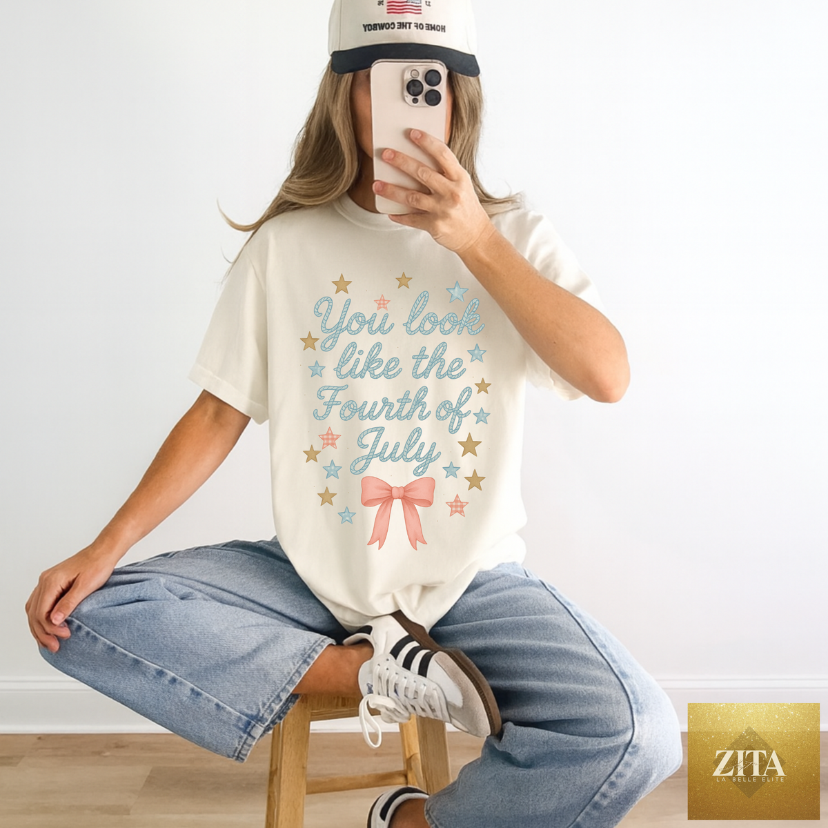 Ivory graphic T-shirt from Hey Jude Graphic Tees featuring patriotic Fourth of July-themed design and vibrant print.