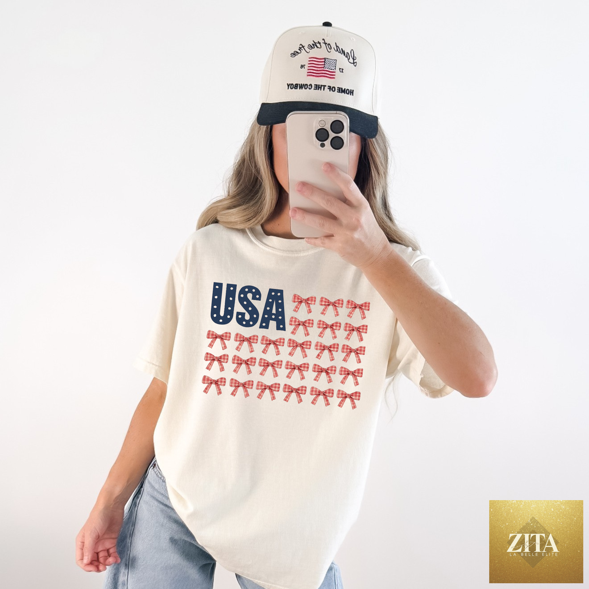 Ivory USA Bow Flag graphic T-shirt by Hey Jude Graphic Tees featuring patriotic gingham bows and a bold flag design.