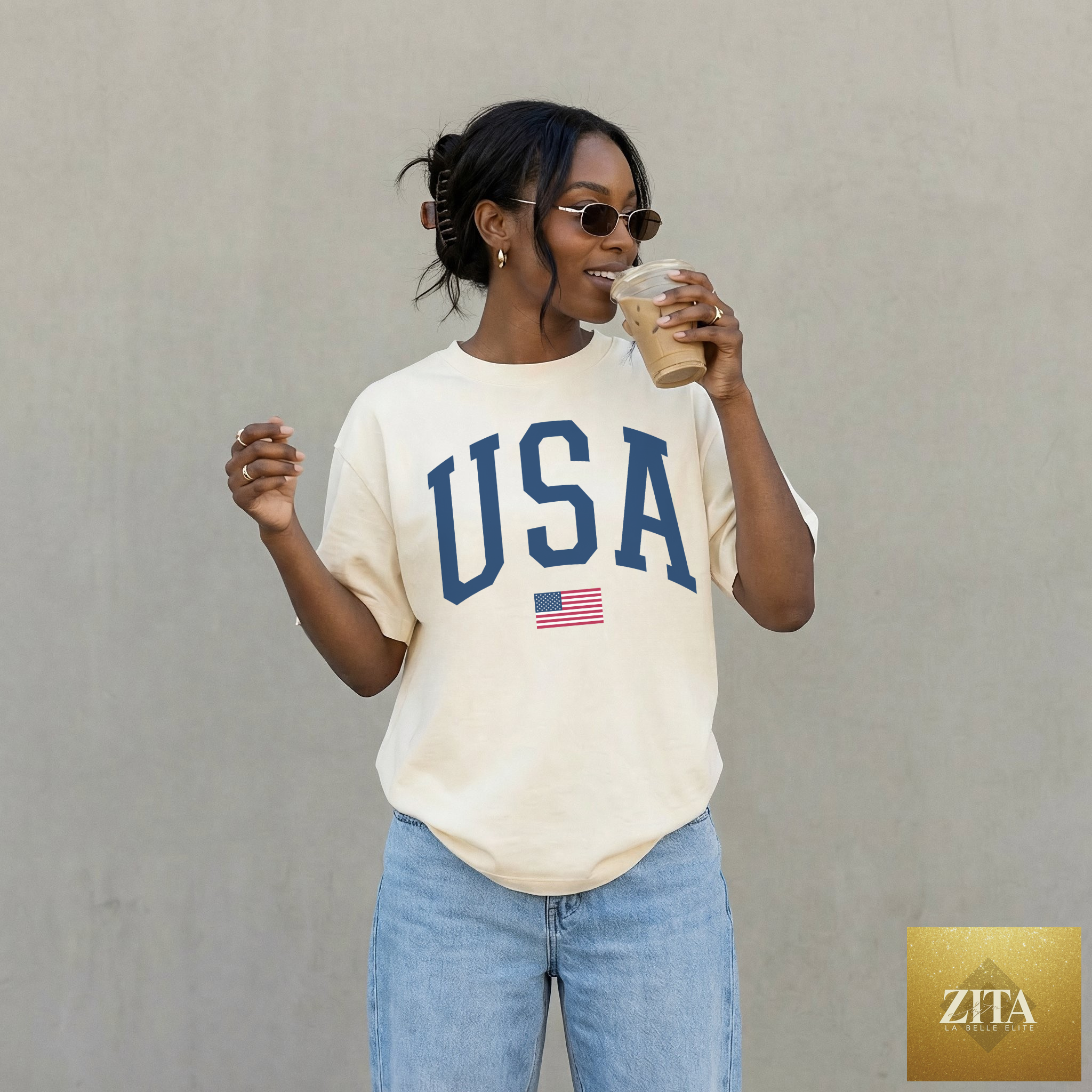 Ivory USA Varsity Graphic Tee by Hey Jude Graphic Tees featuring patriotic design and classic varsity lettering.