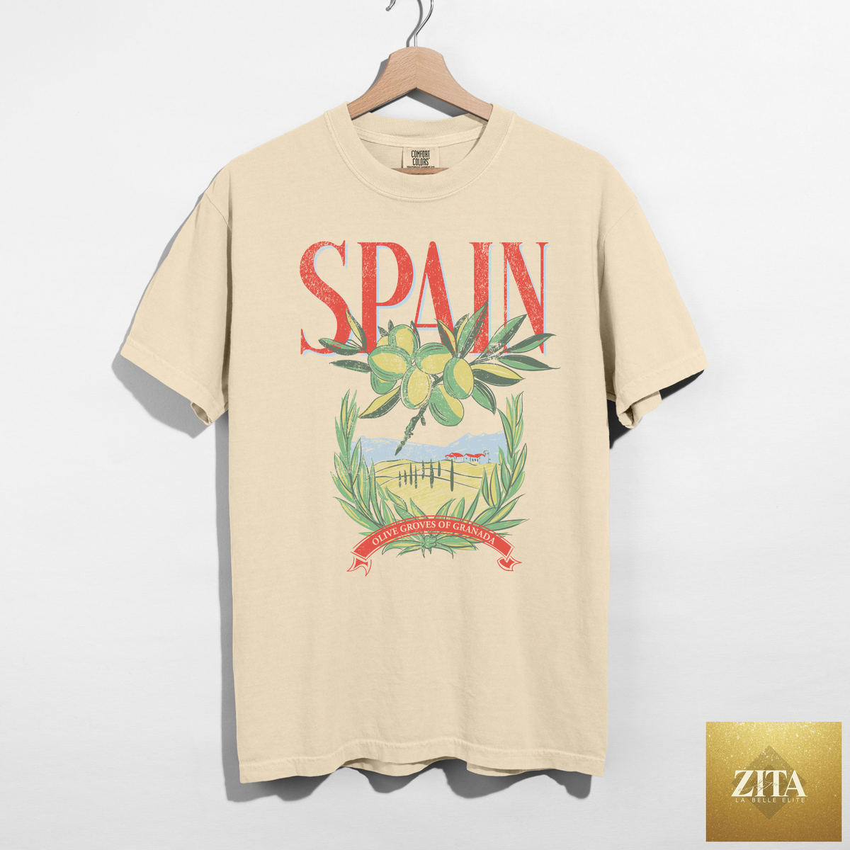 Ivory Spain Graphic Tee featuring an olive grove design, by Hey Jude Graphic Tees, casual shirt perfect for travel and everyday wear.