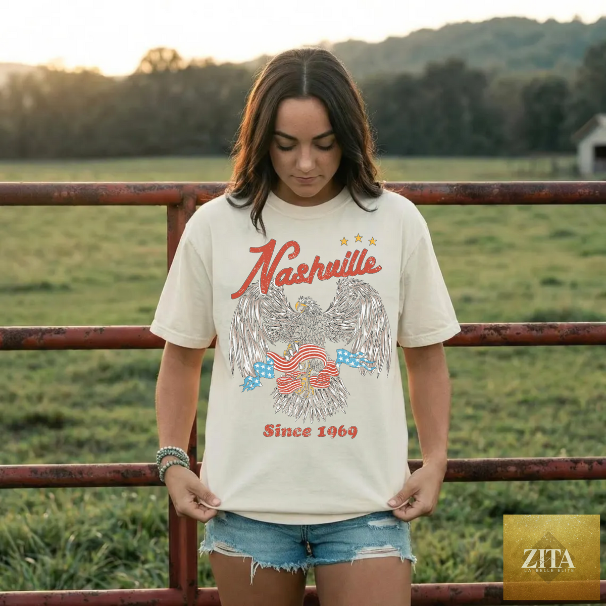 Ivory Nashville Graphic Tee featuring a vintage eagle design, perfect for country concerts, by Hey Jude Graphic Tees.