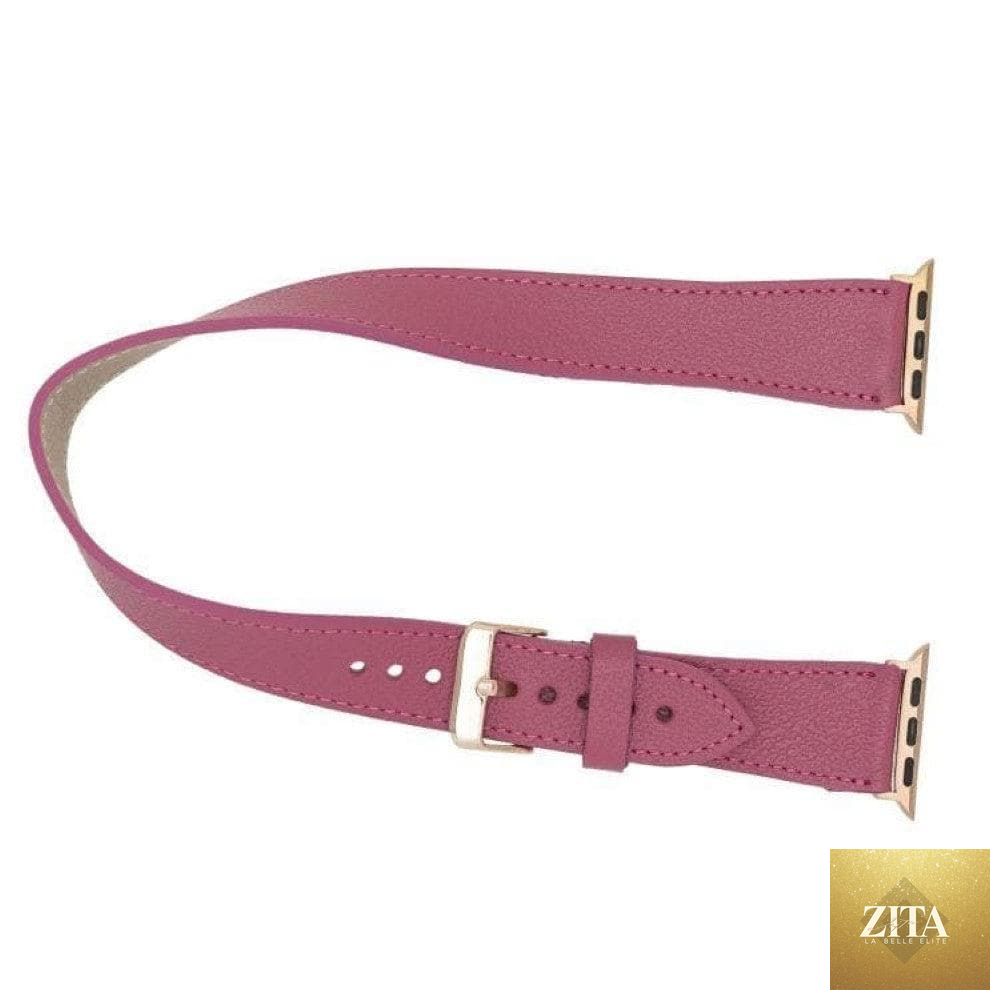 Luxury dark pink leather Apple Watch band by LEATHERE, double wrap style, shown on a wrist with silver watch case.