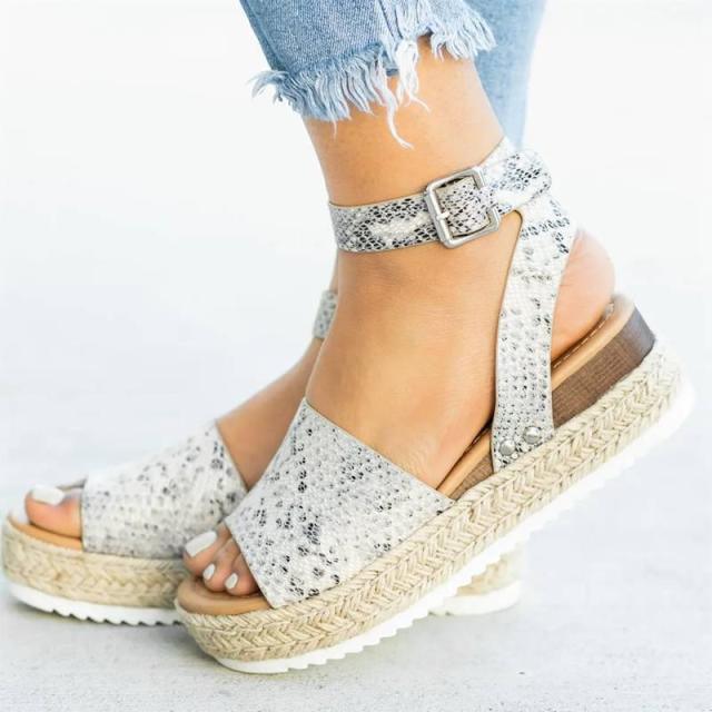 Stevvex women's leopard high heels sandals with adjustable straps, thick platform soles, belt buckle, perfect for summer wear.