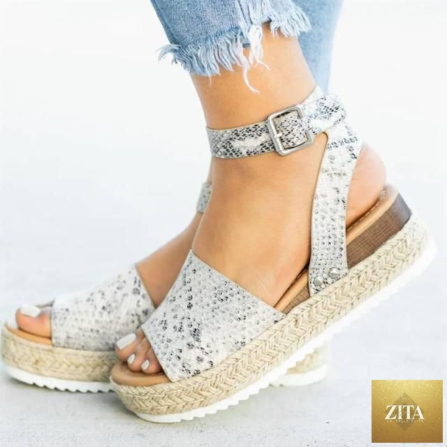 Stevvex women's leopard high heels sandals with adjustable straps, thick platform soles, belt buckle, perfect for summer wear.