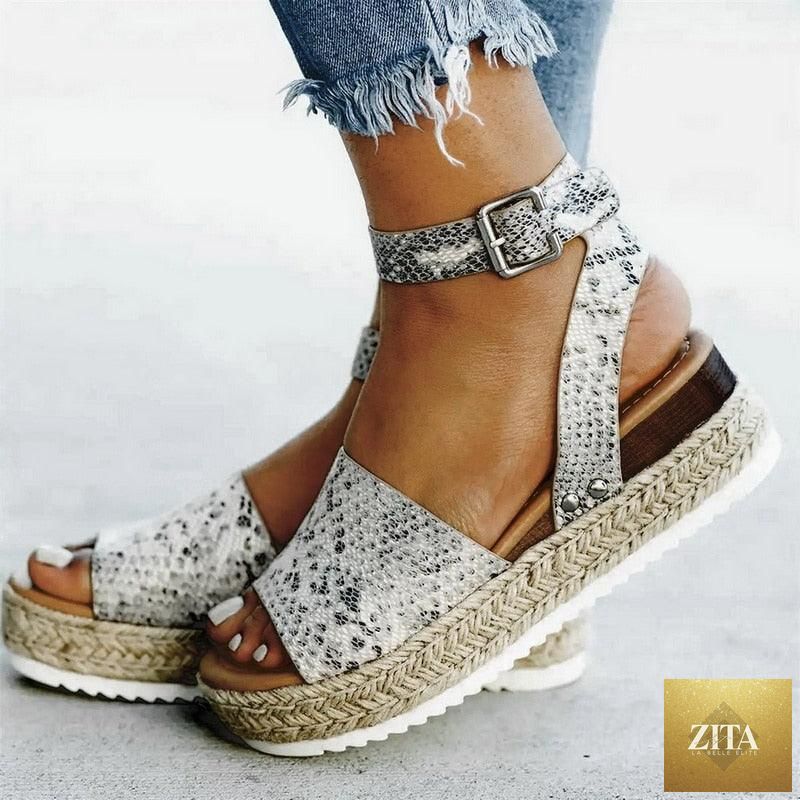 Stevvex ladies leopard high heel platform sandals with thick soles, adjustable straps, belt buckle, perfect for summer wear.