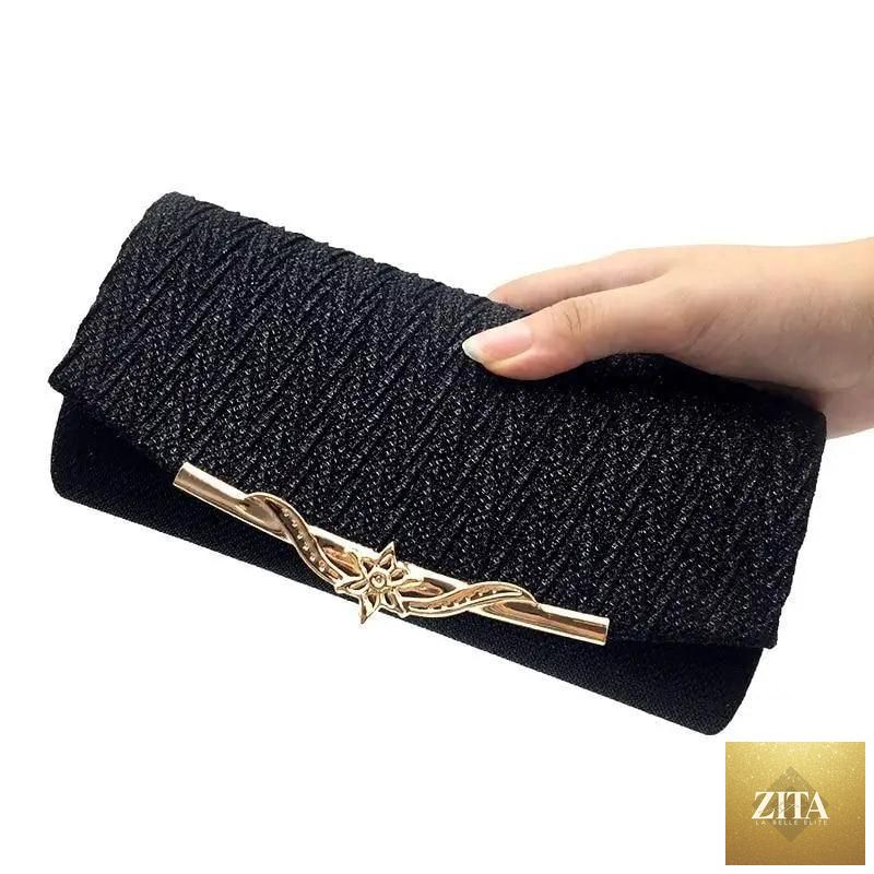 Elegant genuine leather women's evening party clutch by Stevvex with glitter detail, perfect for weddings and special events.