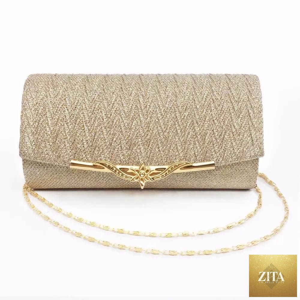 Elegant genuine leather Stevvex women's evening party clutch with glitter details, perfect for weddings and special occasions.