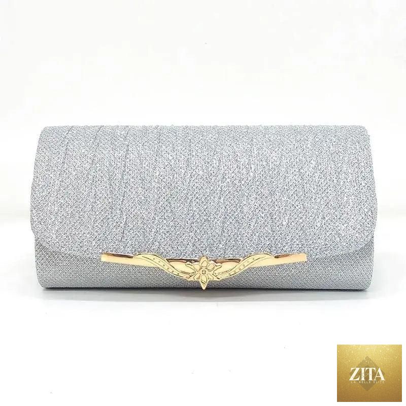 Elegant genuine leather Stevvex women's evening party clutch with glitter detail, perfect for weddings and formal events.