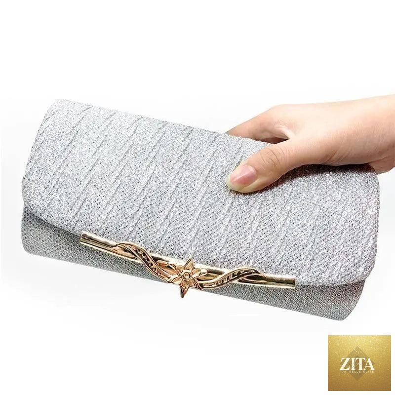 Elegant genuine leather Stevvex women's evening party bag with glitter details, perfect for weddings and special occasions.