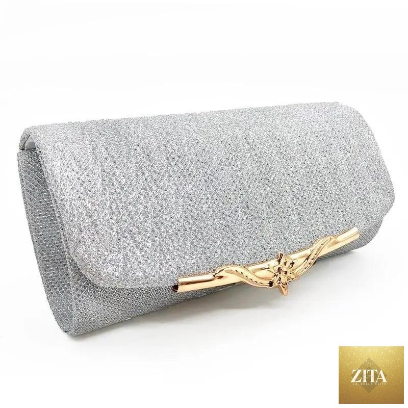 Elegant genuine leather evening clutch bag by Stevvex with glitter detail, perfect for parties, weddings, and special events.
