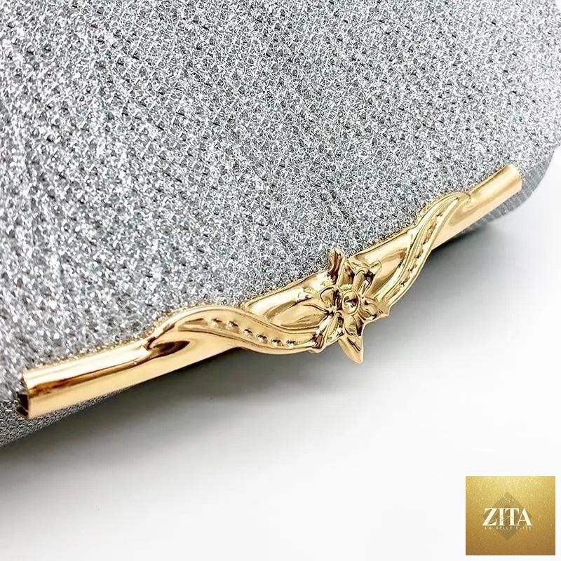 Elegant genuine leather evening clutch handbag by Stevvex with glitter finish, perfect for parties, weddings, and special occasions.