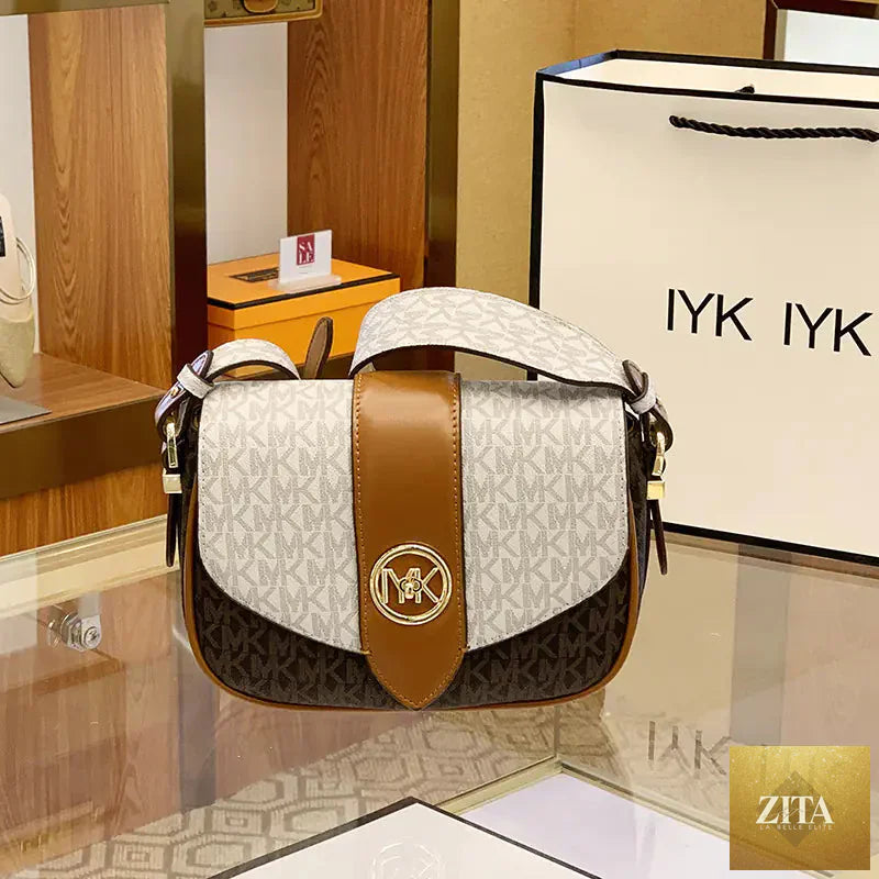 Leather saddle bag for women, stylish purse by Trendy Attic Store01, featuring a sleek design and classic leather finish.