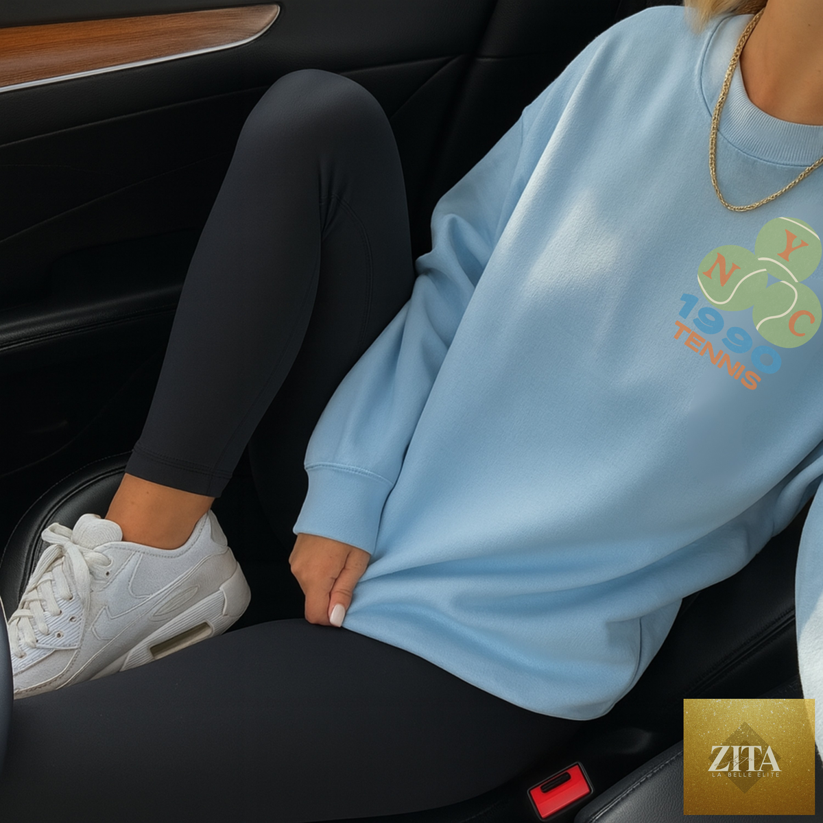 Light blue NYC 1990 Tennis Crewneck Sweatshirt with vintage sport graphic by Hey Jude Graphic Tees, featuring a classic athletic design.
