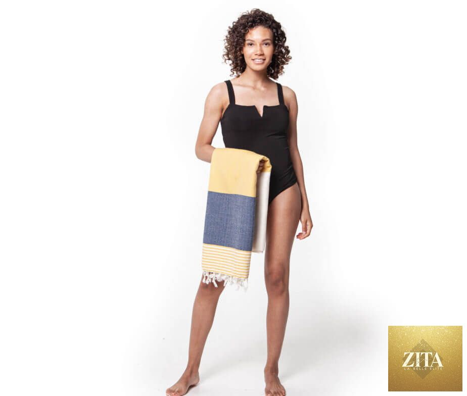 Multi-color Turkish towel bundle from Zita La Belle Elite featuring vibrant, woven Turkish towels displayed neatly.