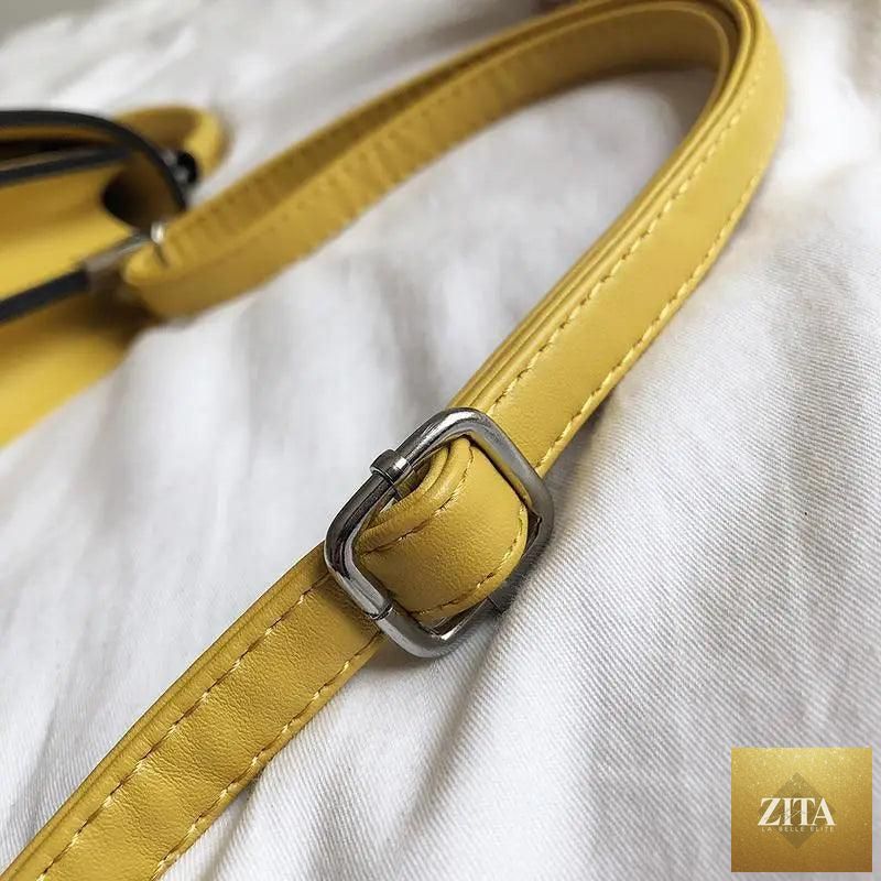 Elegant Stevvex genuine leather women's handbag with large capacity and PU shoulder strap, perfect for stylish, functional use.