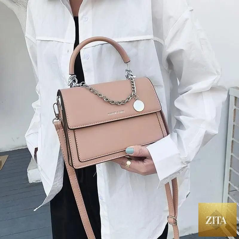 Elegant Stevvex genuine leather women's handbag with large capacity and stylish PU shoulder bag design for women.