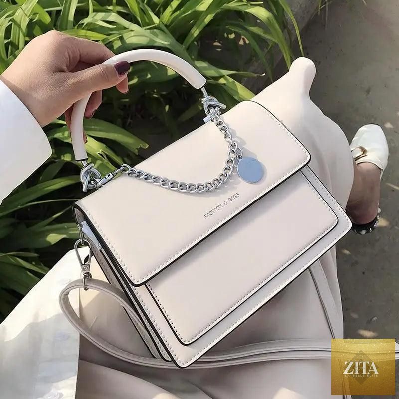 Elegant genuine leather women's handbag by Stevvex, large capacity PU shoulder bag with a luxurious and stylish design for women.