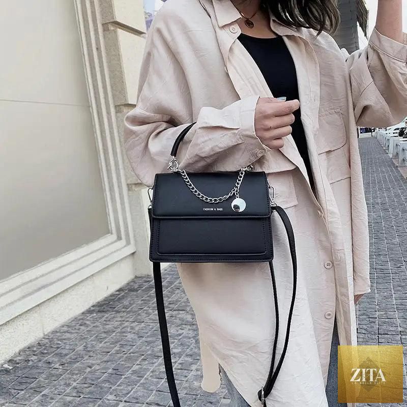 Elegant genuine leather women's handbag by Stevvex, large capacity designer shoulder bag for women with a luxurious look.