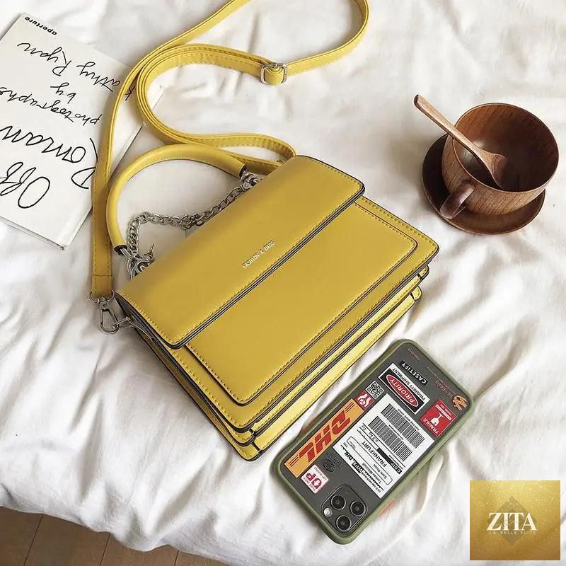 Elegant genuine leather women's handbag by Stevvex with large capacity, PU shoulder bag for stylish, functional female accessories.