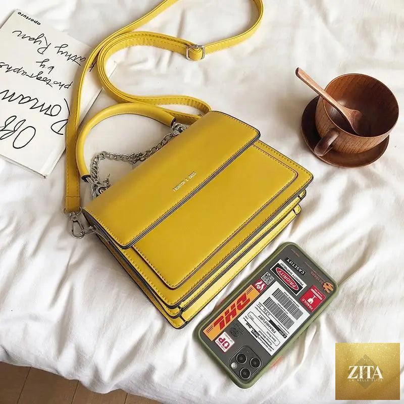 Elegant Stevvex women's genuine leather shoulder handbag with large capacity, stylish design, and versatile use.