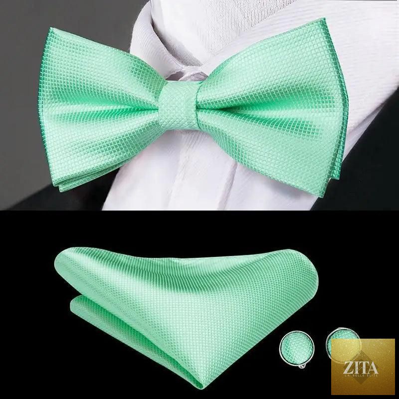 Beige silk butterfly bow tie with matching cufflinks set for men, elegant design suitable for weddings and formal occasions.