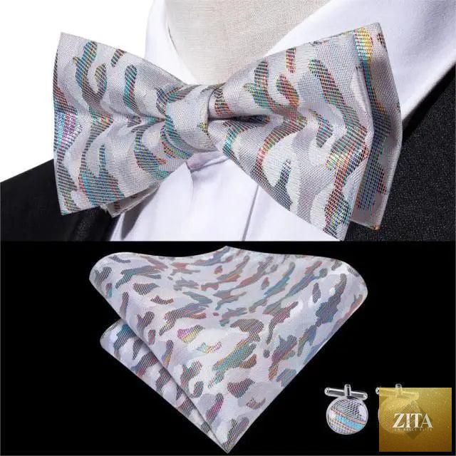Beige silk butterfly bow tie and cufflink set for men by Stevvex, elegant design ideal for weddings and formal events.