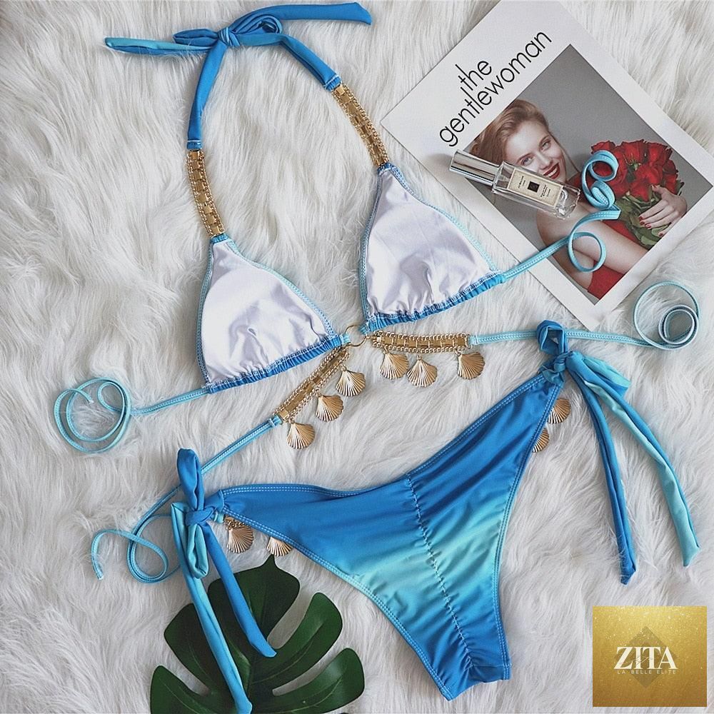 Luxury diamond bikini set by Stevvex featuring a halter top, push-up design, crystal accents, and strappy triangle bottoms for women.