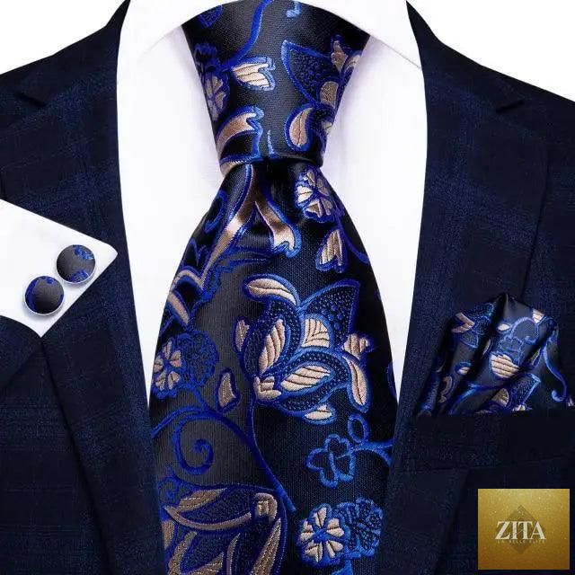 Luxury men's silk necktie, pocket square, handkerchief, and cufflinks set by Stevvex featuring formal printed design.