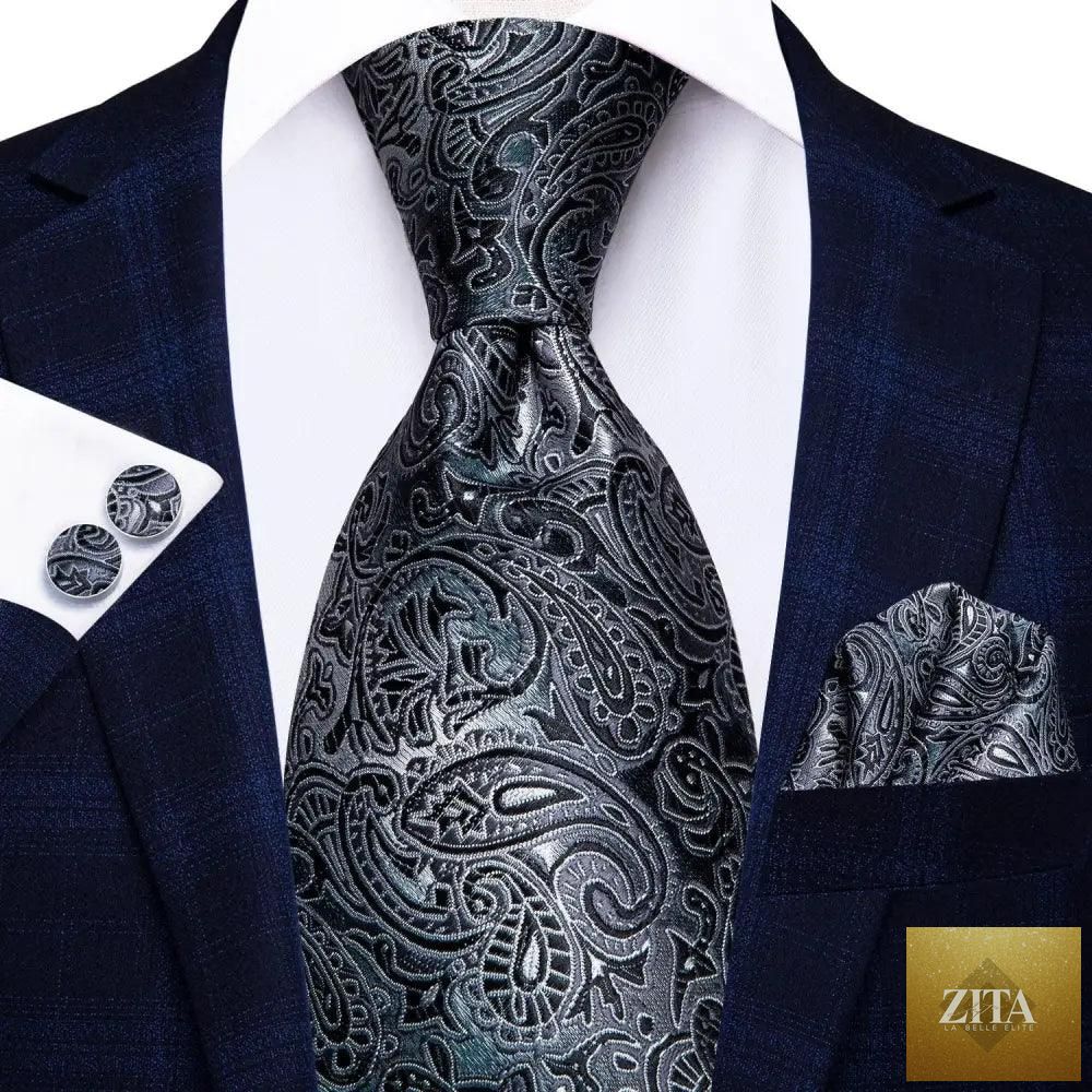 Luxury men's silk necktie, pocket square, handkerchief, and cufflinks set by Stevvex, featuring formal printed design.