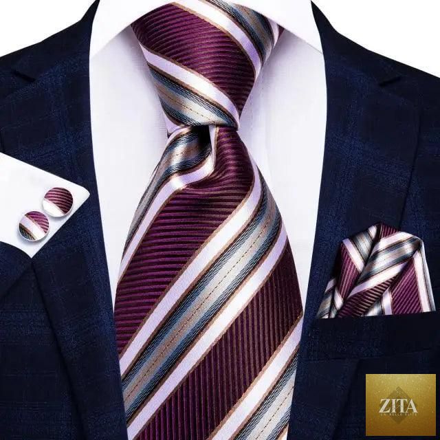 Luxury men's silk necktie, pocket square, handkerchief, and cufflinks set in formal printed design by Stevvex.