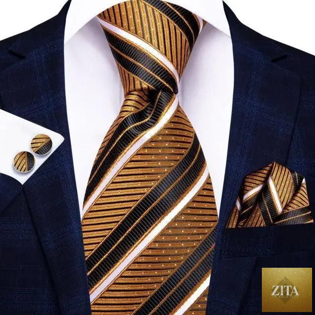 Luxury men's silk necktie, matching pocket square, handkerchief, and cufflinks set by Stevvex for formal business attire.