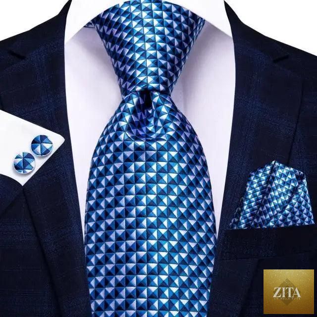 Luxury men's silk necktie, pocket square, handkerchief, and cufflinks set by Stevvex with formal printed design.