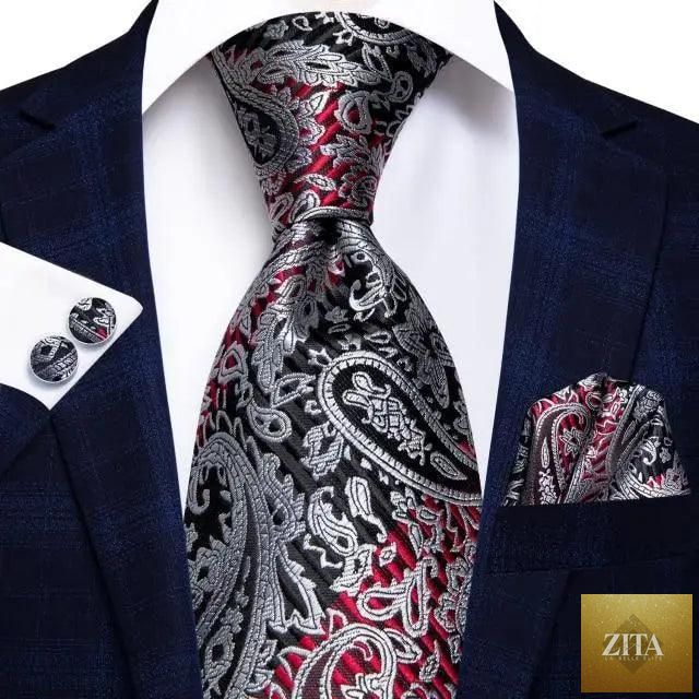 Luxury silk men's necktie, pocket square, handkerchief, and cufflinks set featuring formal printed design for business and special occasions.