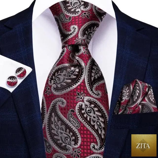 Luxury men's silk necktie, pocket square, handkerchief, and cufflinks set by Stevvex, with formal printed design for business attire.