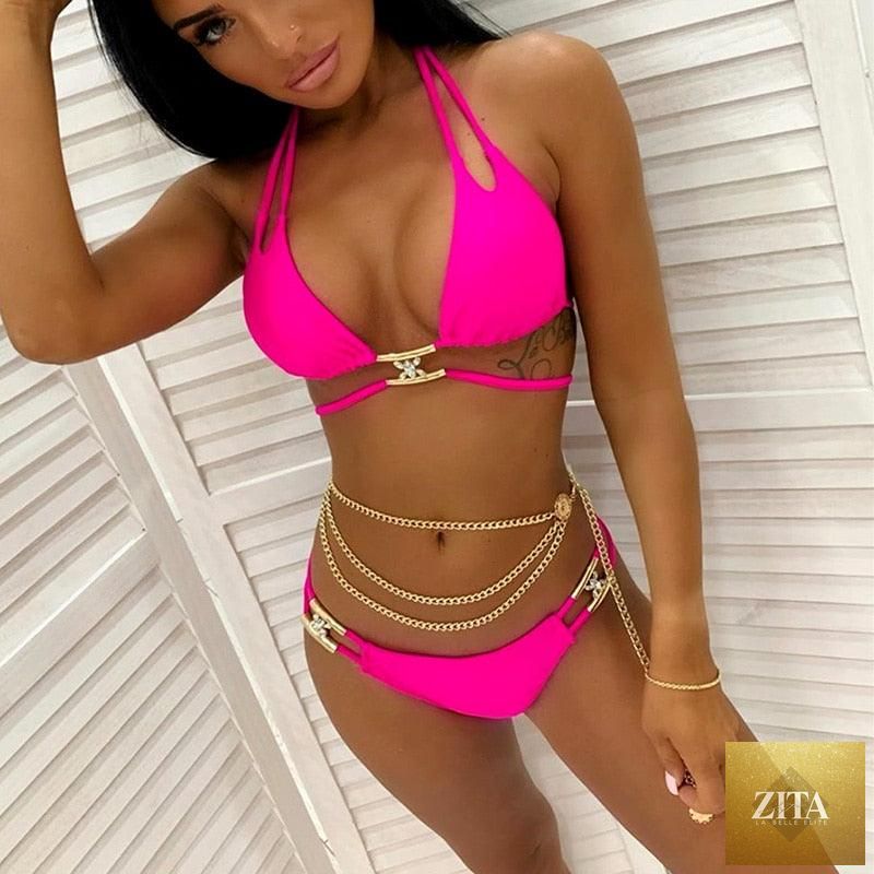 Luxury purple Stevvex bikini set with halter top, rhinestones, crystal embellishments, low waist, and tie-side bottoms for women.
