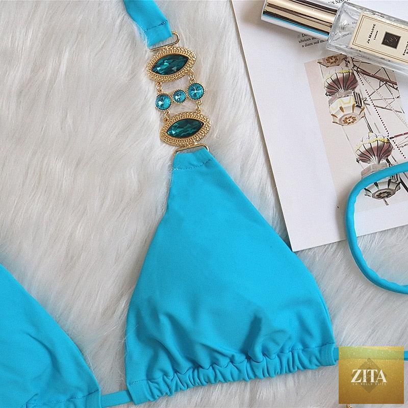 Luxury purple crystal diamond bikini set for women, halter style with low waist and tie side design, featuring rhinestone accents.