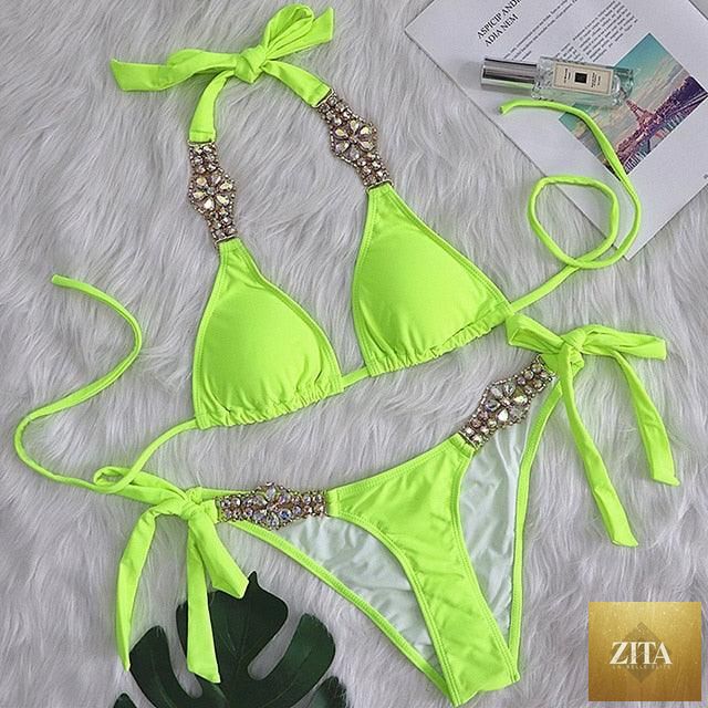 Stevvex luxury purple halter crystal diamond bikini set for women, low waist swimwear with rhinestone accents and tie-side design.