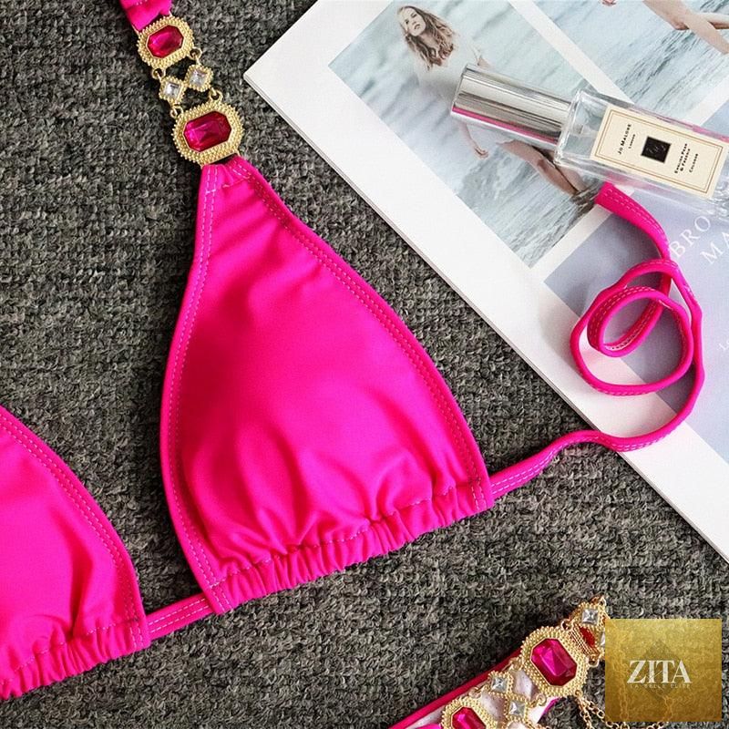 Luxury purple Stevvex bikini set with halter top, rhinestones, low waist, and tie-side bottom, perfect for stylish women’s swimwear.