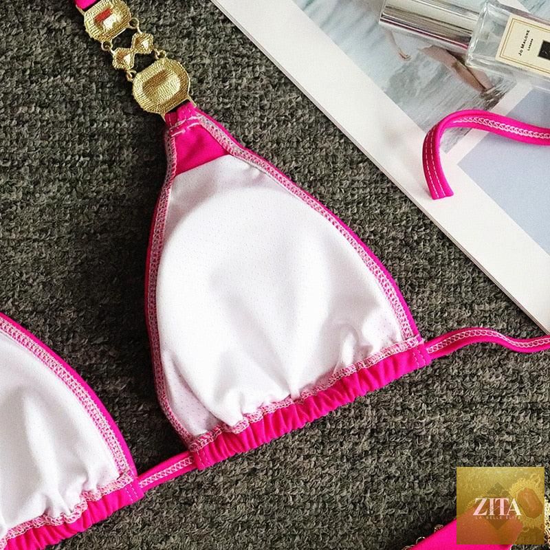 Luxury purple Stevvex bikini set featuring a halter top with crystal diamonds and low waist tie-side design, perfect for women’s swimwear.
