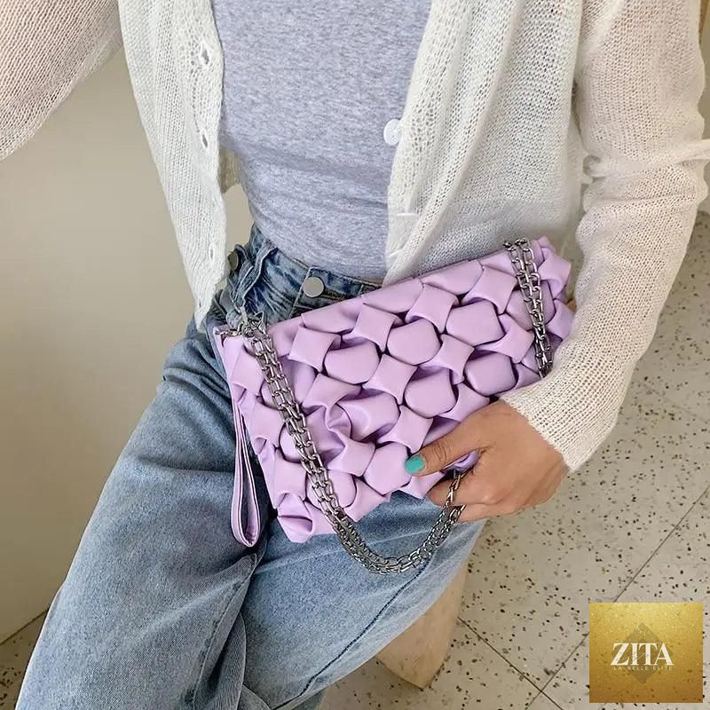 Elegant genuine leather Stevvex handbag with metal chain strap, featuring a clutch and shoulder bag style for women and girls.