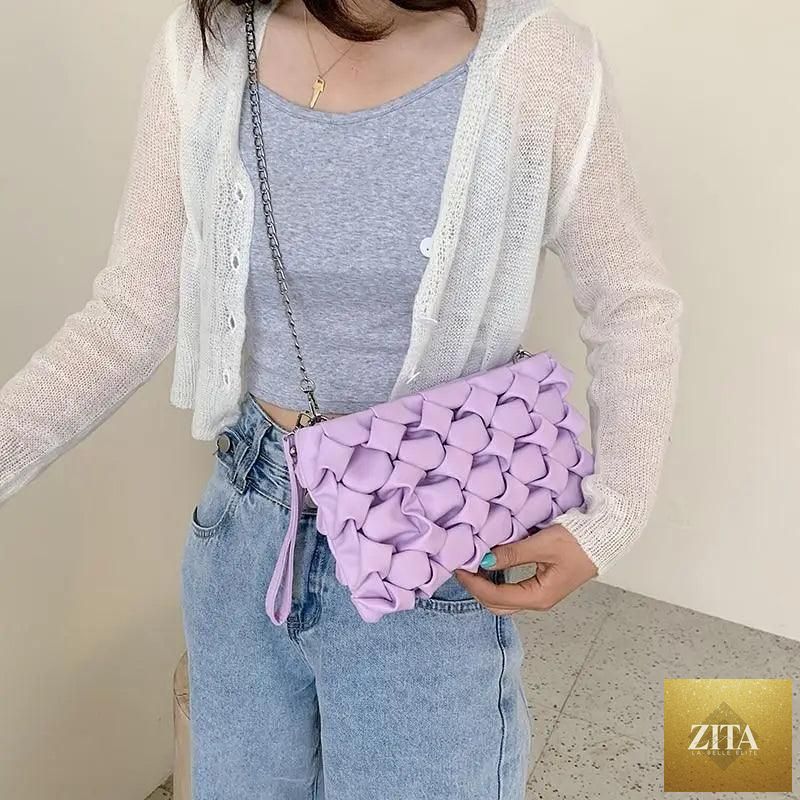 Elegant genuine leather Stevvex handbag with metal chain, designed as a versatile clutch or shoulder bag for women and girls.