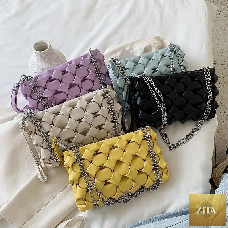 Elegant genuine leather handbag by Stevvex featuring a metal chain strap, designed for women and girls.