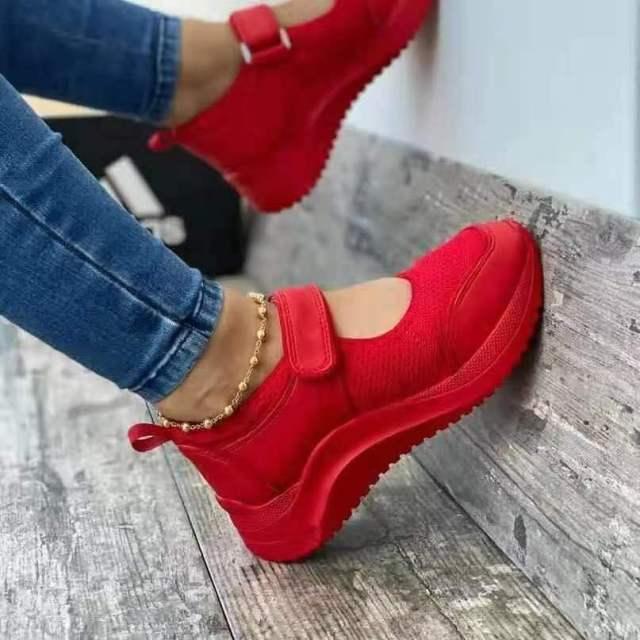 Red women's sneakers by Stevvex featuring breathable mesh, platform soles, vulcanized design, and non-slip, comfortable casual sports shoes.