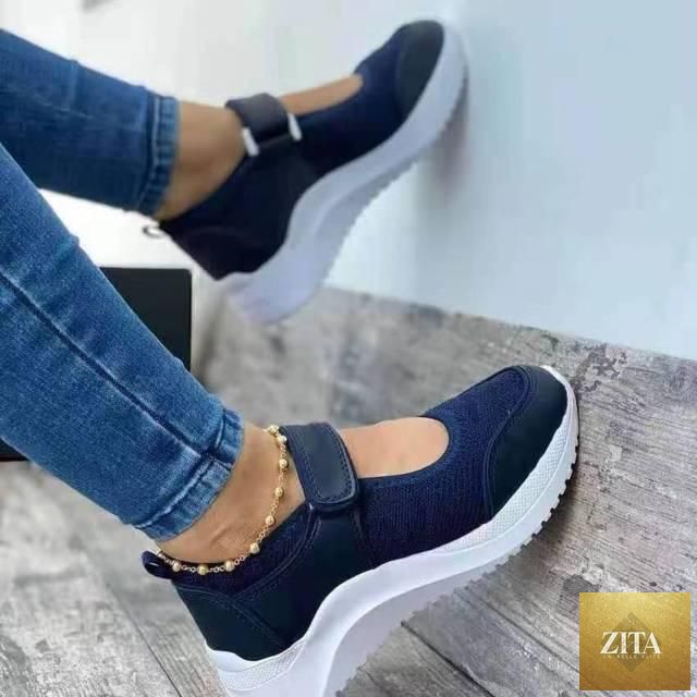 Red women's Stevvex casual sneakers with breathable mesh, platform sole, slip-resistant outsole, ideal for summer comfort and style.