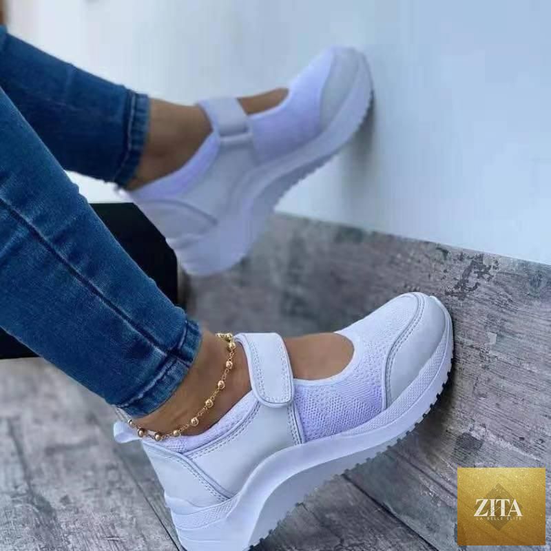 Red women's sneakers by Stevvex with breathable mesh, platform sole, vulcanized design, non-slip sole, and casual comfort.