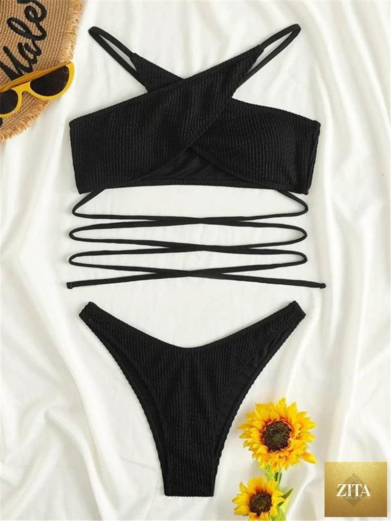 Stevvex luxury women's black halter bikini set with floral print, high waist string bottoms, push-up design, and two-piece swimsuit.
