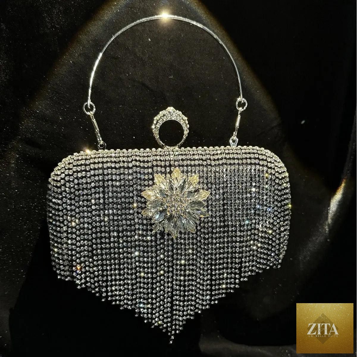 Mariams Collection luxury rhinestones tassel evening clutch bag with detachable chain for parties and proms.