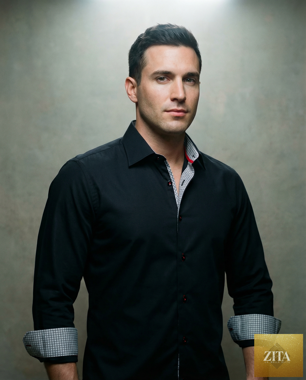 Man wearing a black LEVINAS® cotton knit-stretch button-up shirt with contrast details, tailored fit, and long sleeves.